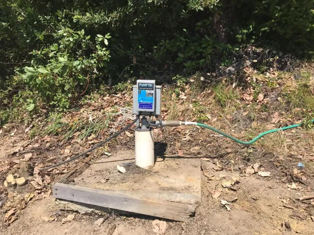 a view of a city with mountains in the background