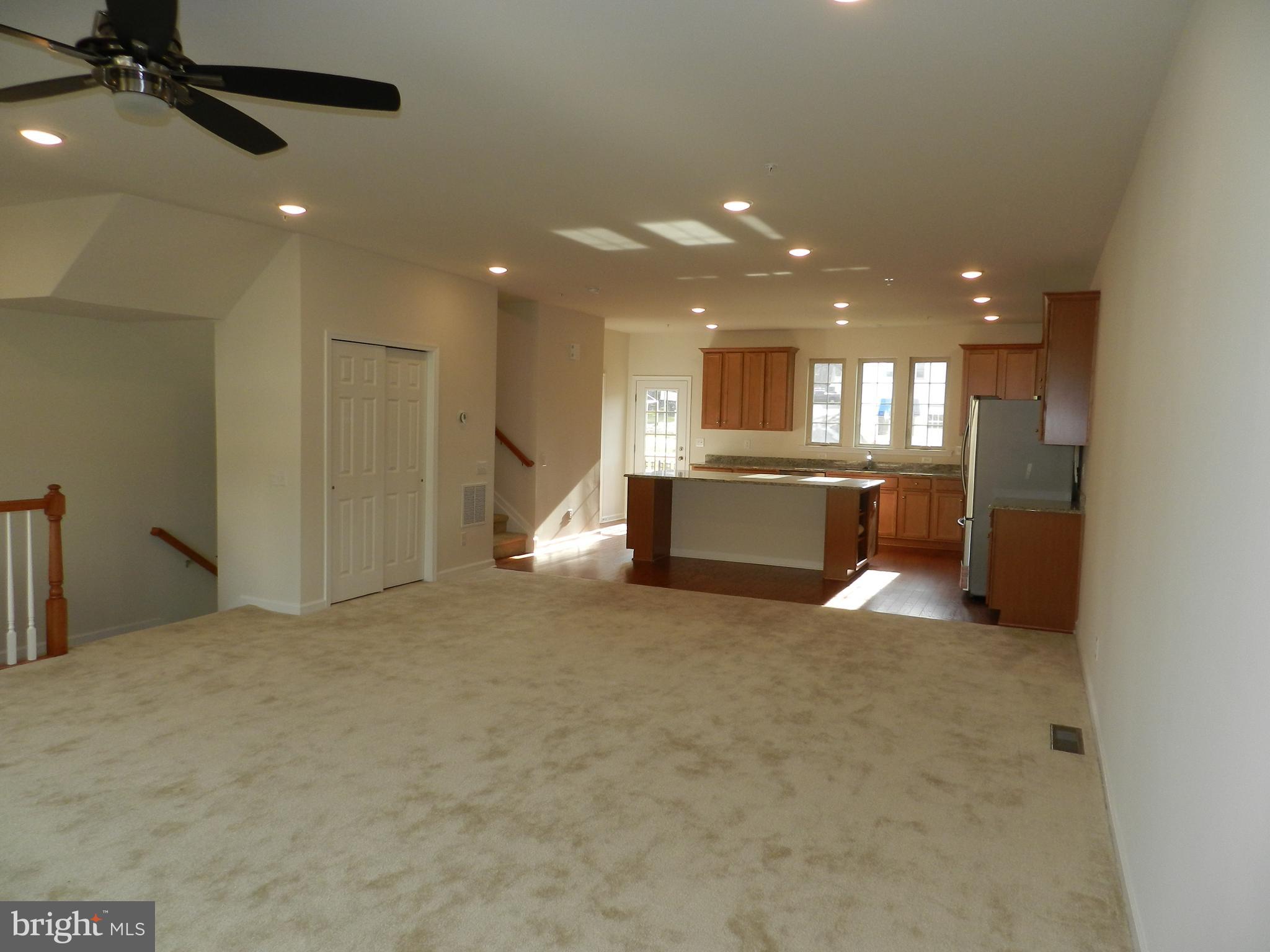 27 Eagle Lane Malvern, PA 19355 - Photo 5 of 24 a view of a kitchen with a sink and a refrigerator