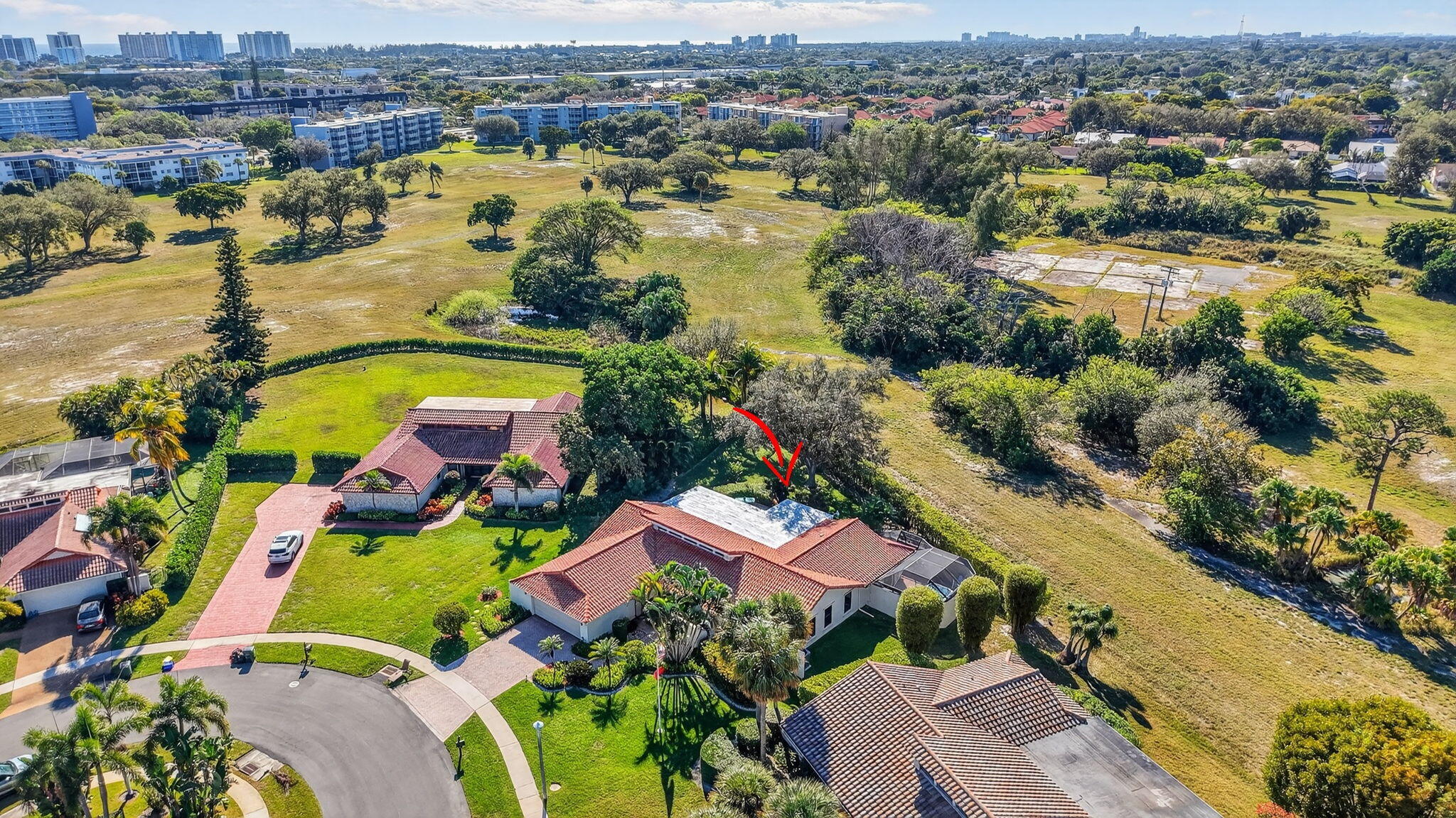 5470 Northwest 3rd Terrace Boca Raton, FL 33487 - Photo 62 of 72 an aerial view of residential houses with outdoor space