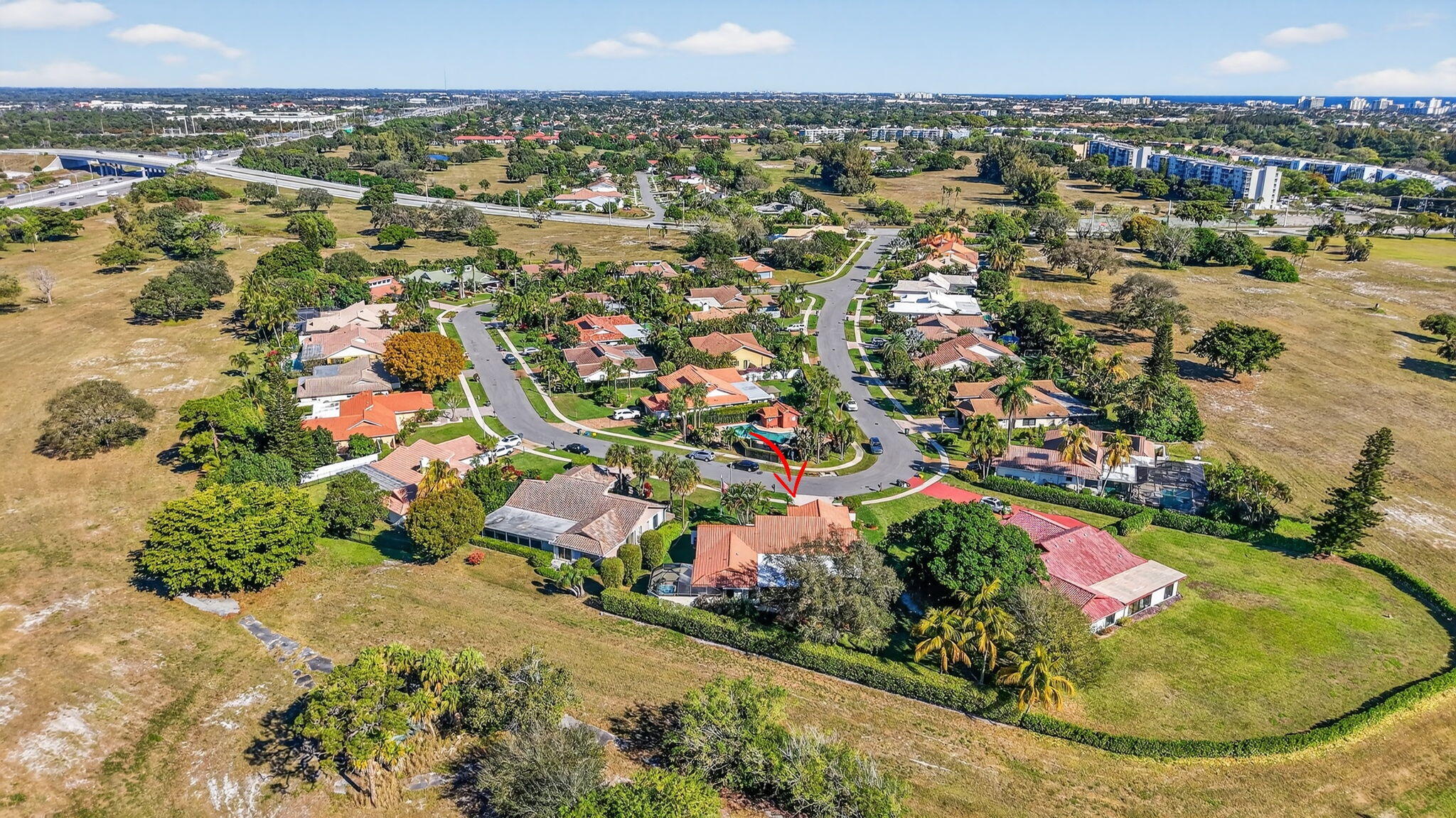5470 Northwest 3rd Terrace Boca Raton, FL 33487 - Photo 64 of 72 an aerial view of residential houses with outdoor space