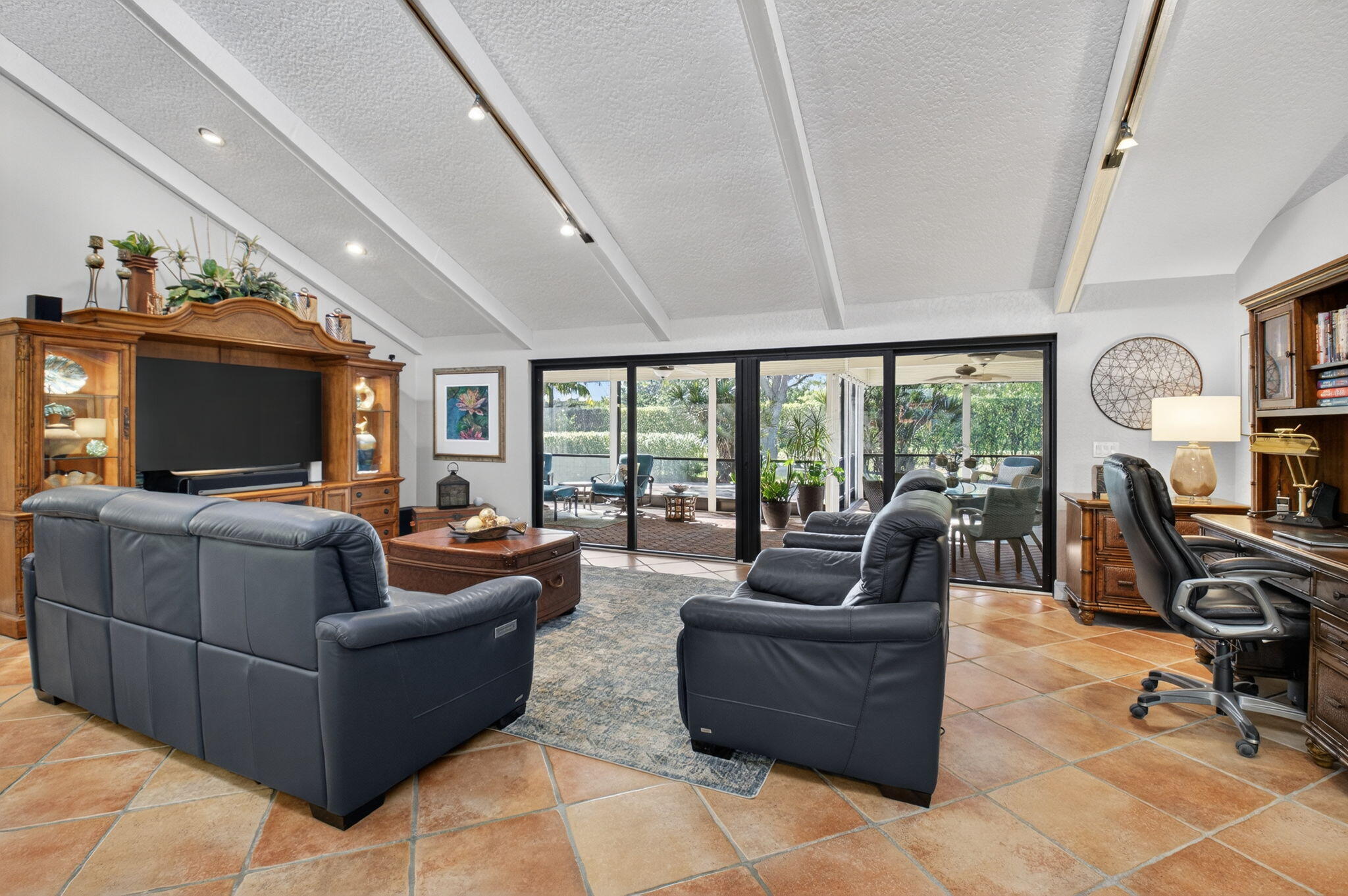 5470 Northwest 3rd Terrace Boca Raton, FL 33487 - Photo 10 of 72 a living room with furniture and a flat screen tv