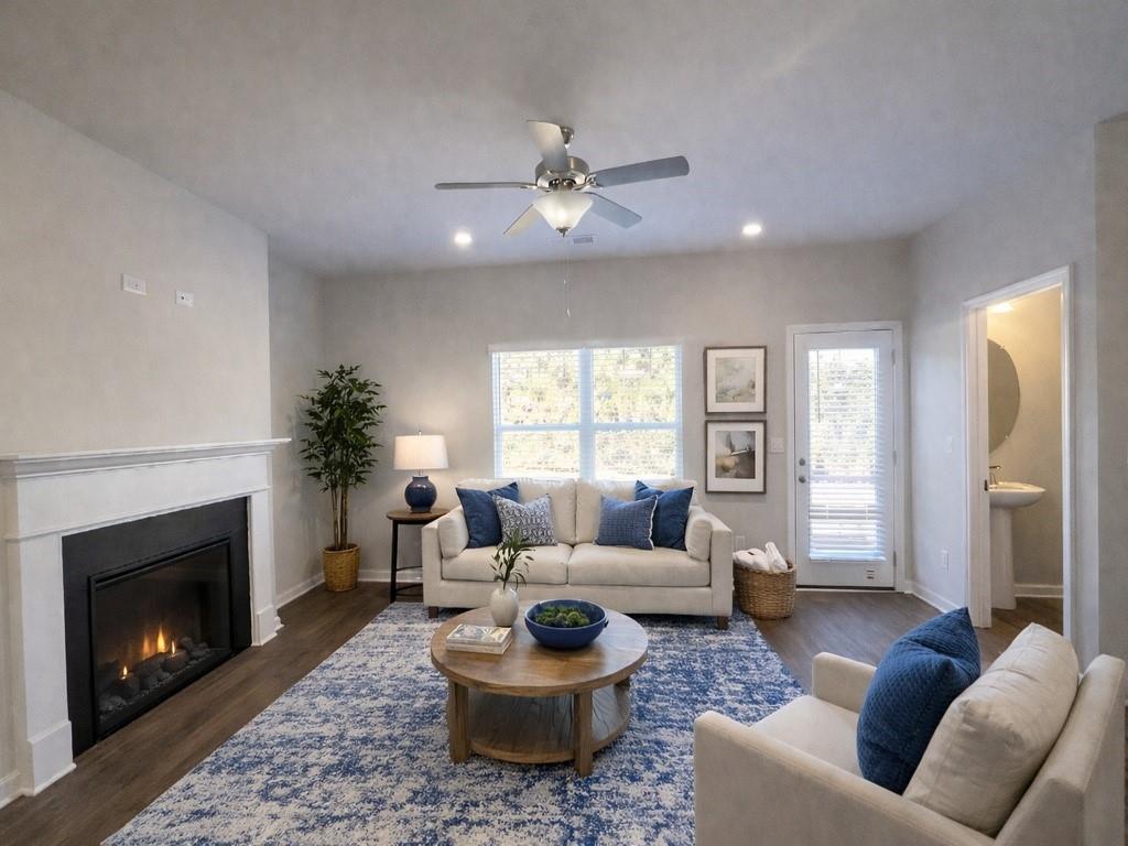 6343 Towhee Way Morrow, GA 30260 - Photo 3 of 36 a living room with furniture and a fireplace