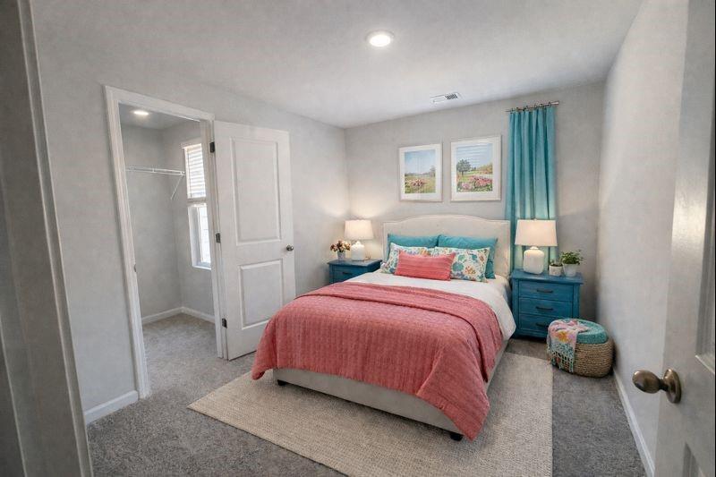 6343 Towhee Way Morrow, GA 30260 - Photo 6 of 36 a bedroom with a bed and a window