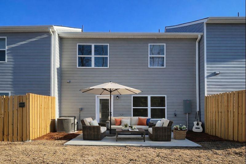 6343 Towhee Way Morrow, GA 30260 - Photo 9 of 36 a backyard of a house with seating space