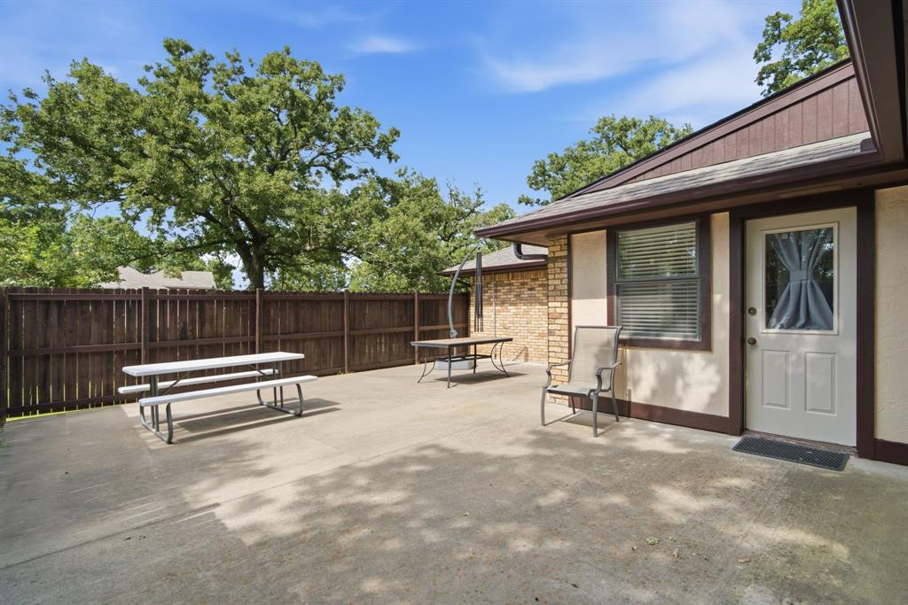 305 Bent Oak Road Weatherford, TX 76086 - Photo 31 of 35 Back patio fenced for privacy