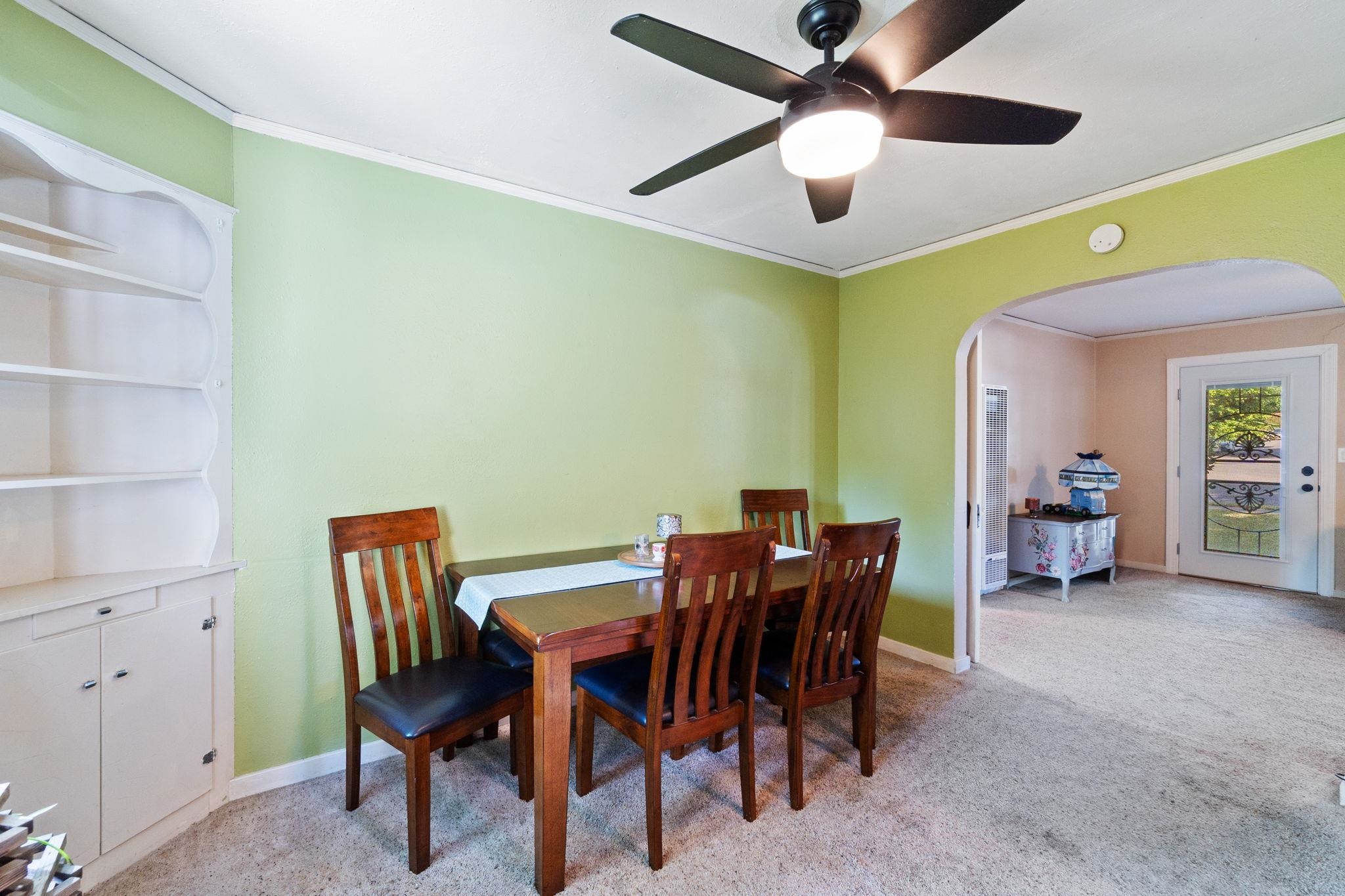 355 Jackson Street Red Bluff, CA 96080 - Photo 7 of 24 a view of a dining room with furniture and a chandelier fan