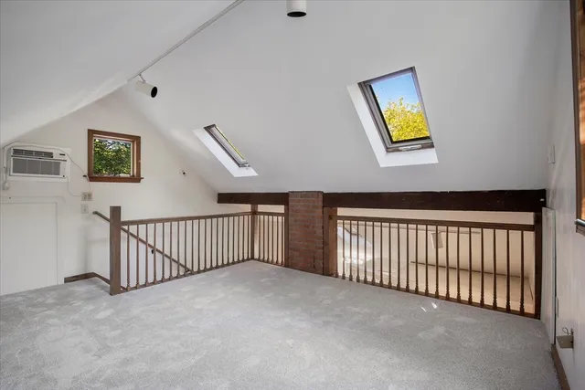 a view of a hallway with workspace