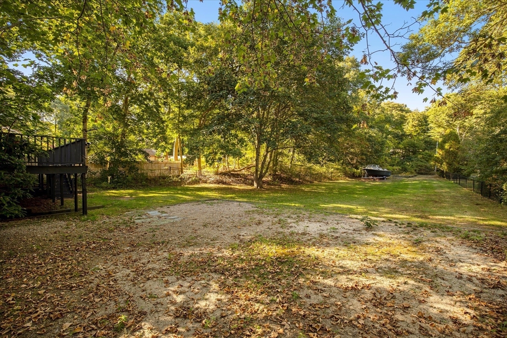 254 Barlows Landing Road Bourne, MA 02559 - Photo 22 of 27 a view of a field with an trees