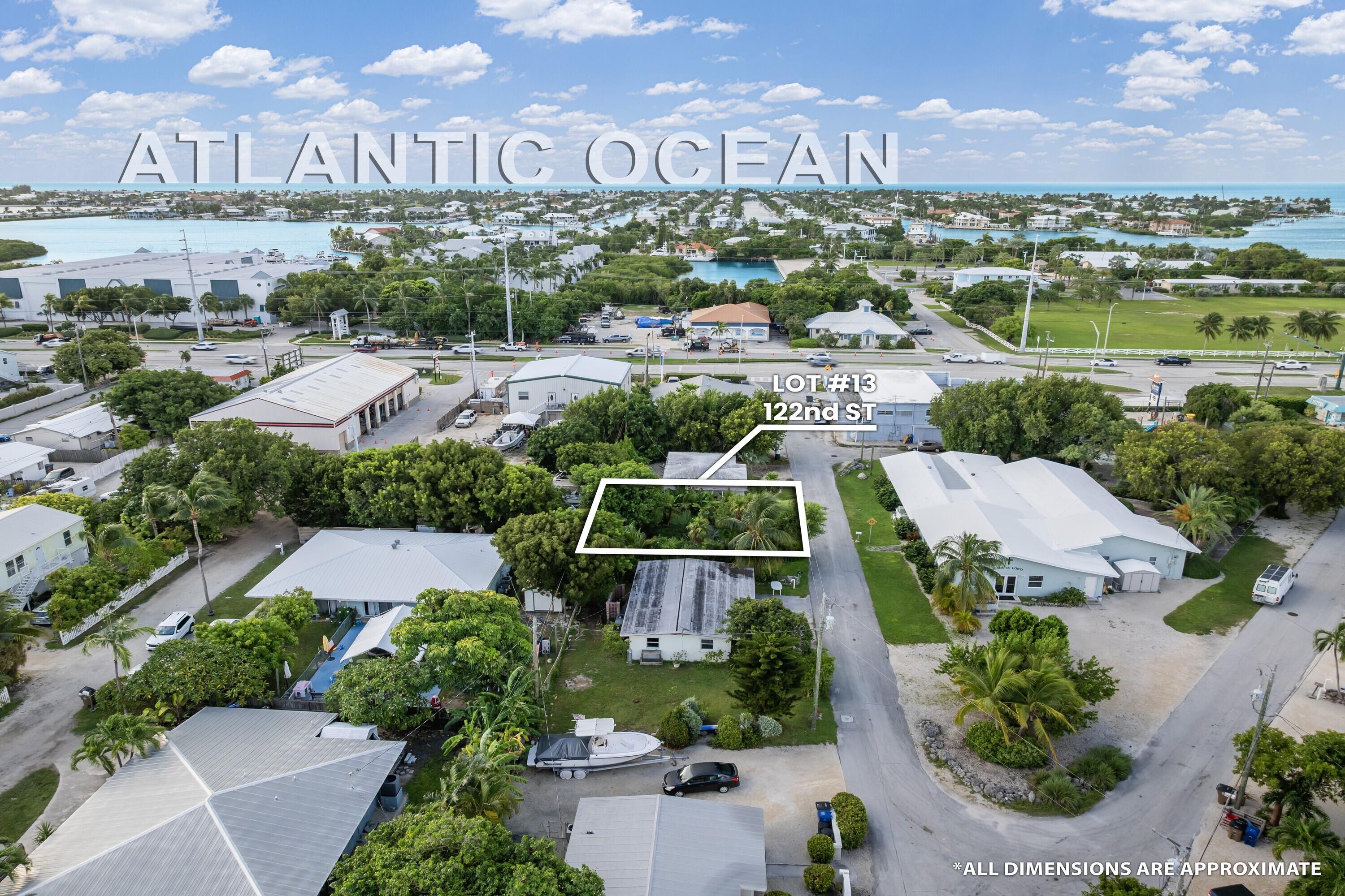 122nd Street Marathon, FL 33050 - Photo 12 of 16 an aerial view of residential houses with outdoor space and river