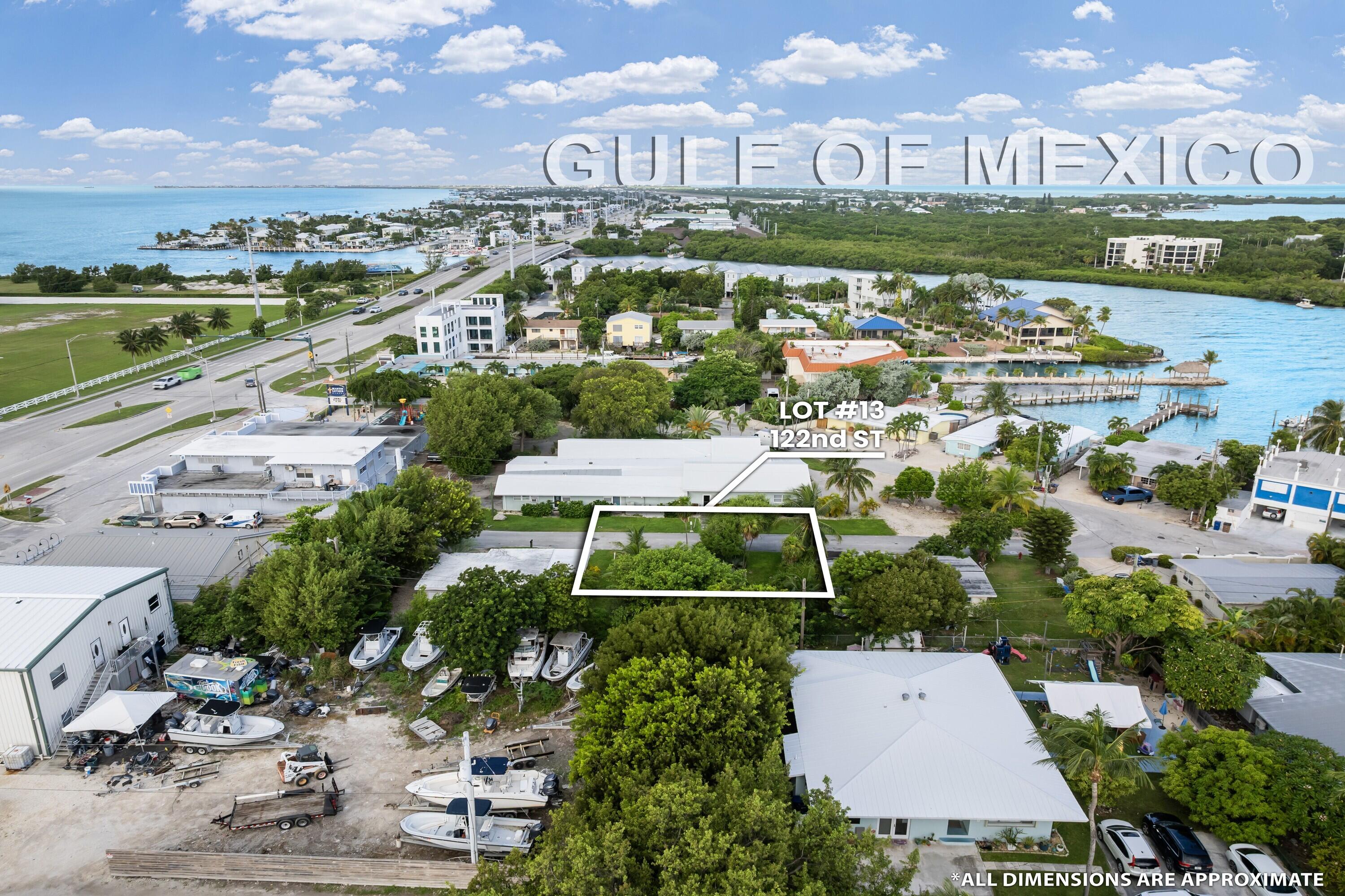 122nd Street Marathon, FL 33050 - Photo 14 of 16 an aerial view of residential houses with outdoor space