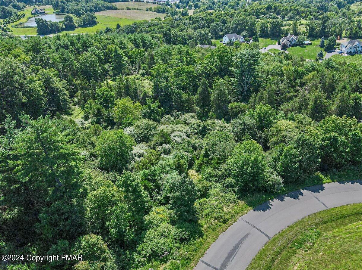 19-20 Kettle Ridge Drive Stroudsburg, PA 18360 - Photo 10 of 15 an aerial view of a house with a yard