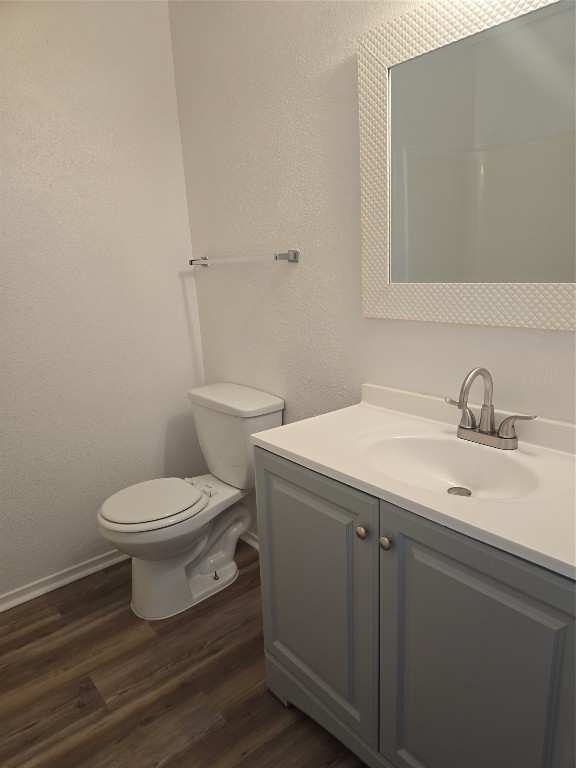 12906 Leader Street, Unit 2906 Houston, TX 77072 - Photo 14 of 16 a bathroom with a toilet sink and mirror