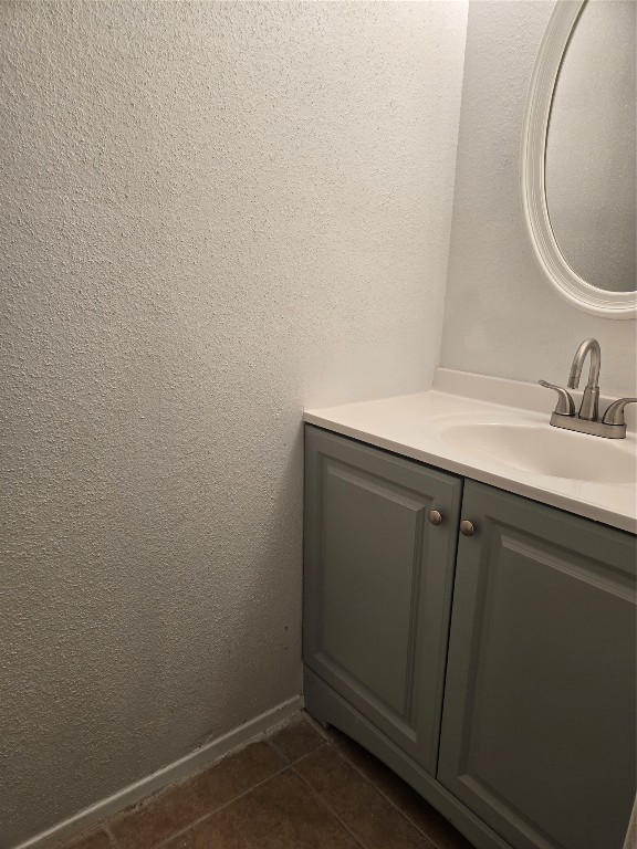 12906 Leader Street, Unit 2906 Houston, TX 77072 - Photo 15 of 16 a bathroom with a sink and a mirror