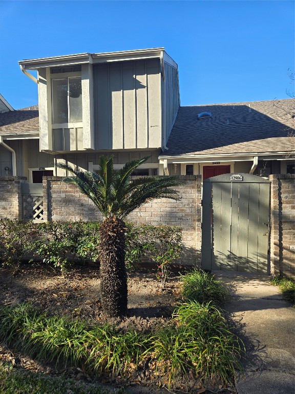 12906 Leader Street, Unit 2906 Houston, TX 77072 - Photo 2 of 16 a front view of a house with garden