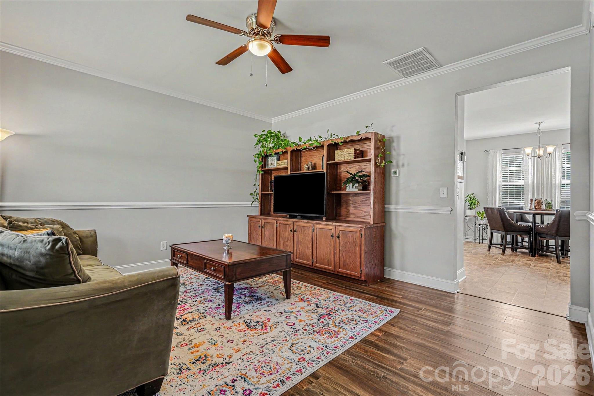 1610 Walter Hasty Road Monroe, NC 28110 - Photo 23 of 32 a living room with furniture and a flat screen tv