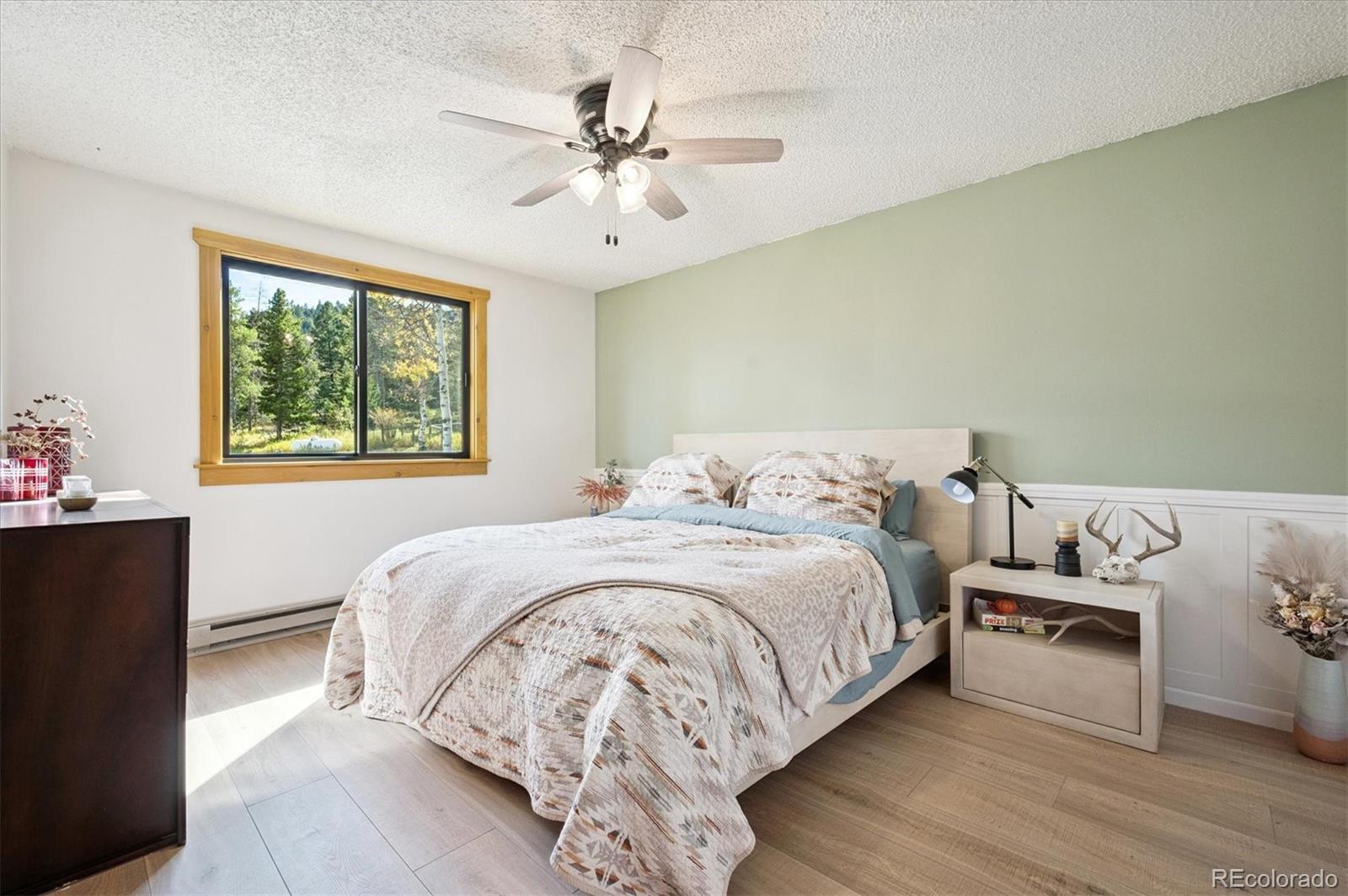 12369 Quartz Spur Conifer, CO 80433 - Photo 13 of 36 a bedroom with bed and window
