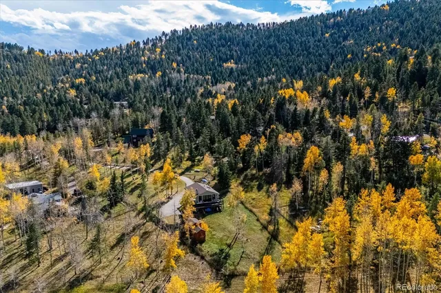 a view of houses with a lake