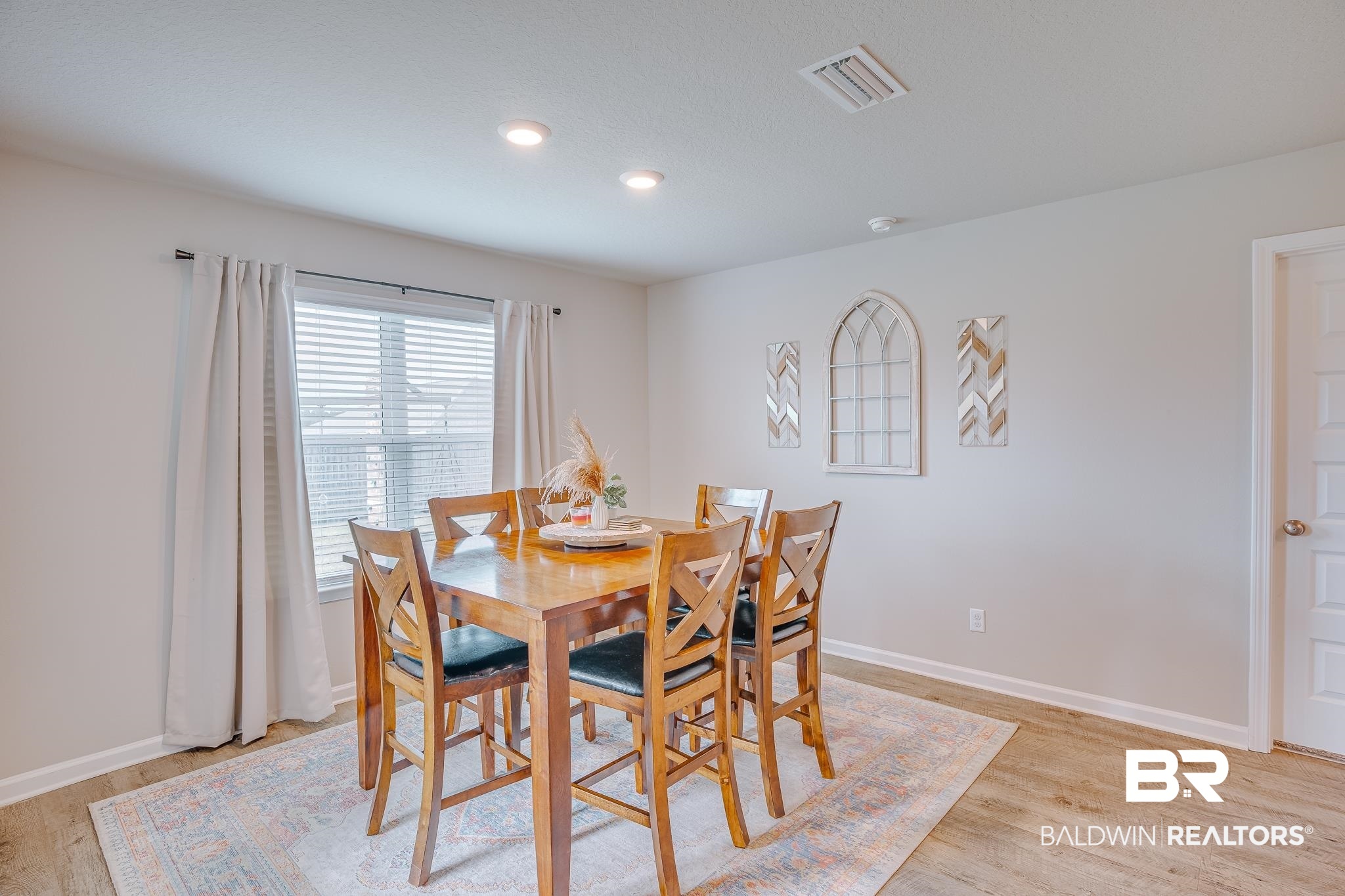 8242 Sycamore Way Semmes, AL 36575 - Photo 12 of 43 Dining room with light wood-style floors and recessed lighting