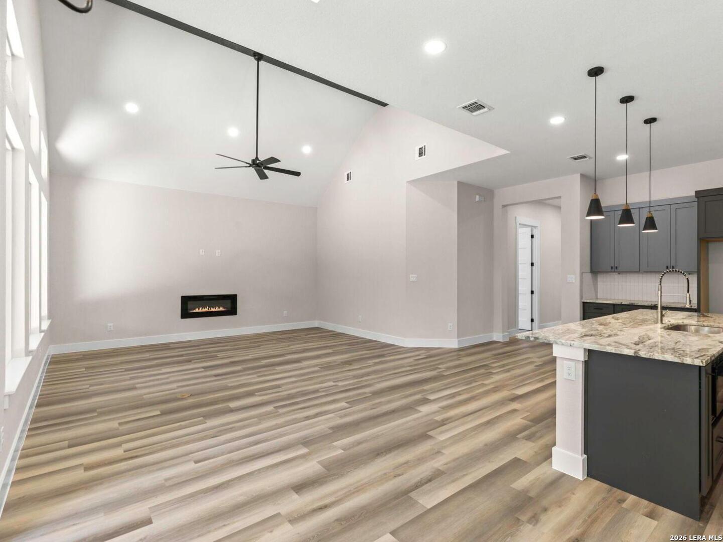 1270 Misty Lane Spring Branch, TX 78070 - Photo 12 of 48 a bathroom with a sink a mirror and shower
