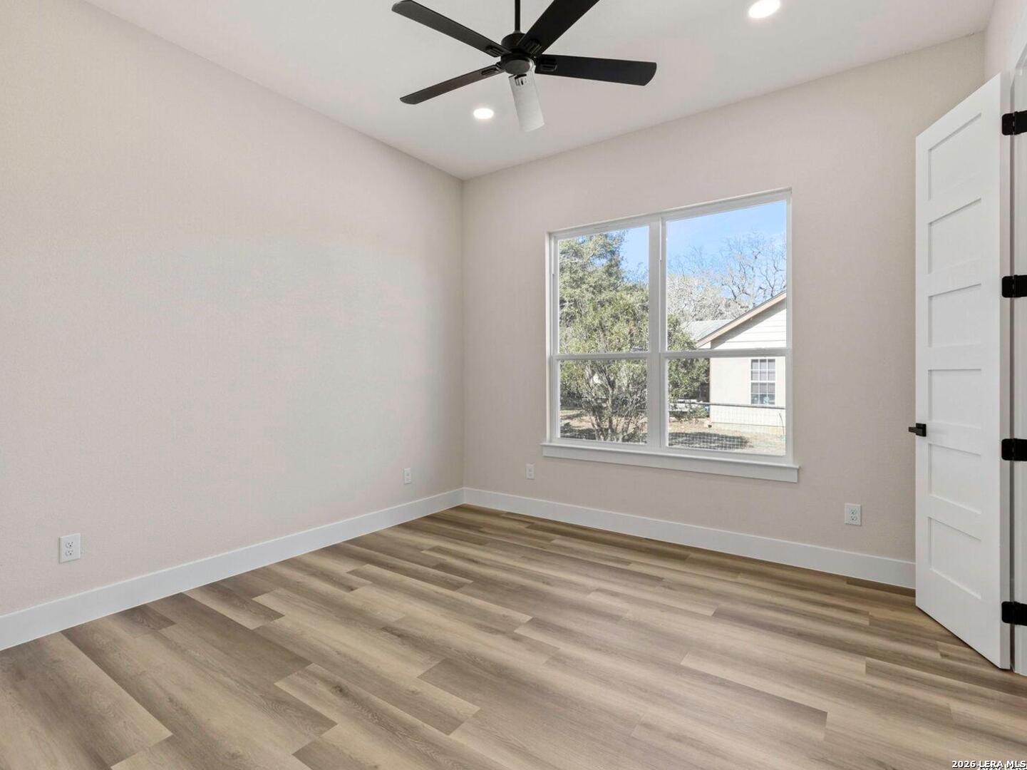 1270 Misty Lane Spring Branch, TX 78070 - Photo 22 of 48 a view of an empty room with a window