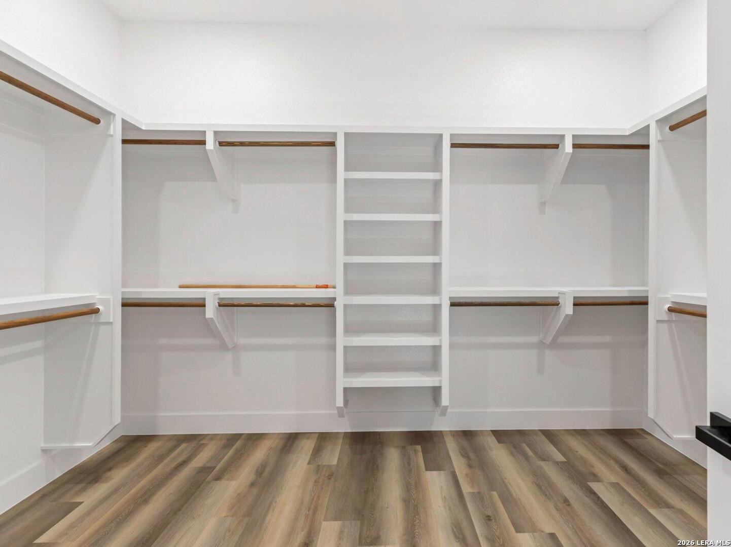 1270 Misty Lane Spring Branch, TX 78070 - Photo 30 of 48 a view of walk in closet with empty racks