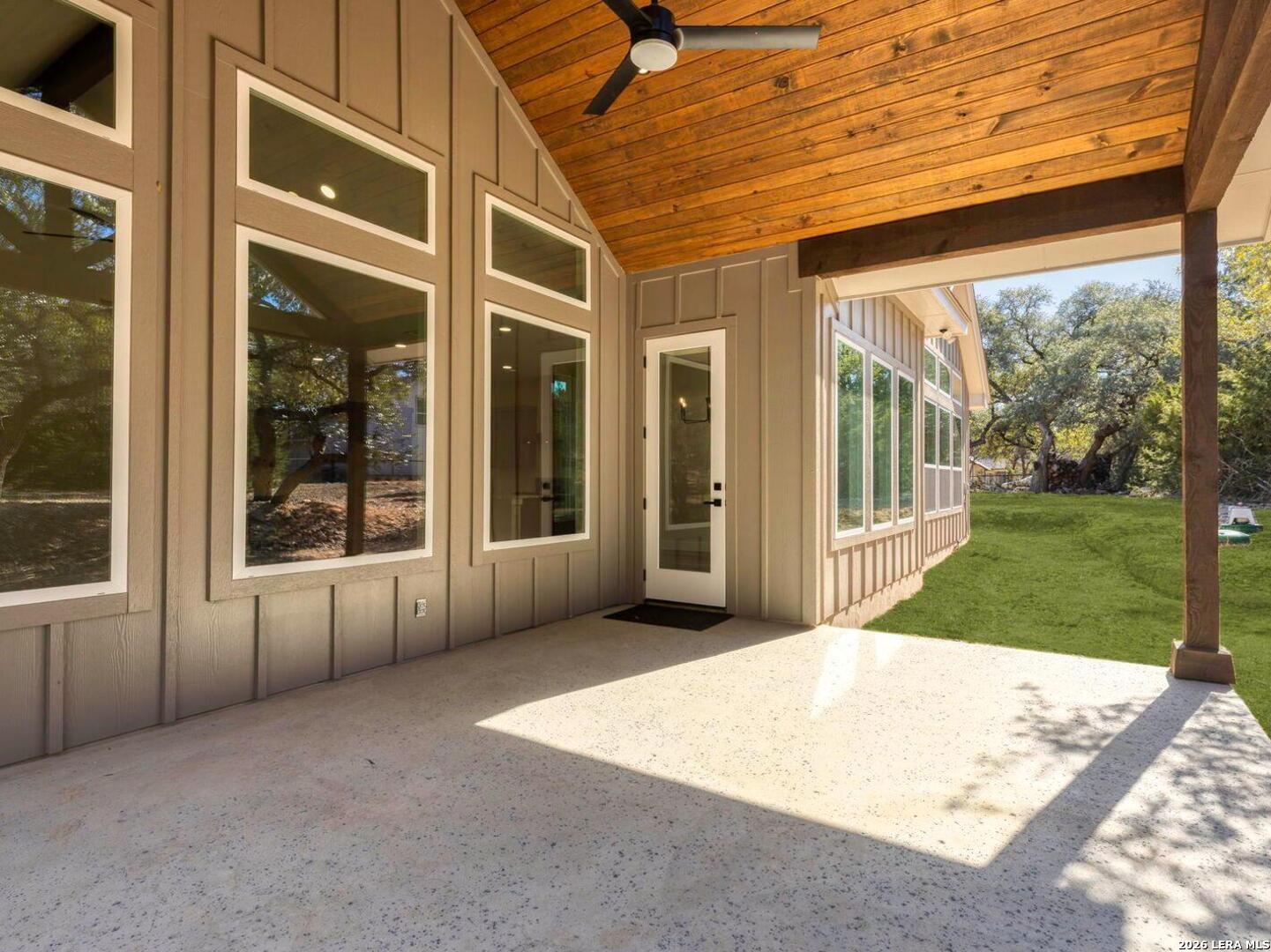1270 Misty Lane Spring Branch, TX 78070 - Photo 33 of 48 a view of a porch with a floor to ceiling window