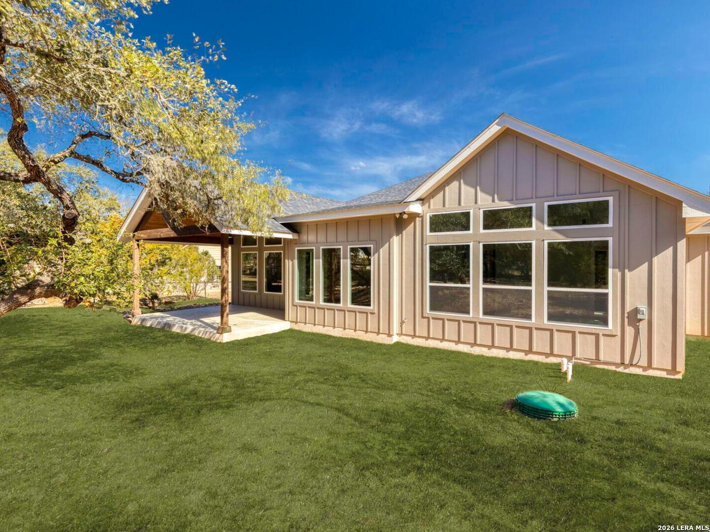 1270 Misty Lane Spring Branch, TX 78070 - Photo 36 of 48 a view of a house with a yard