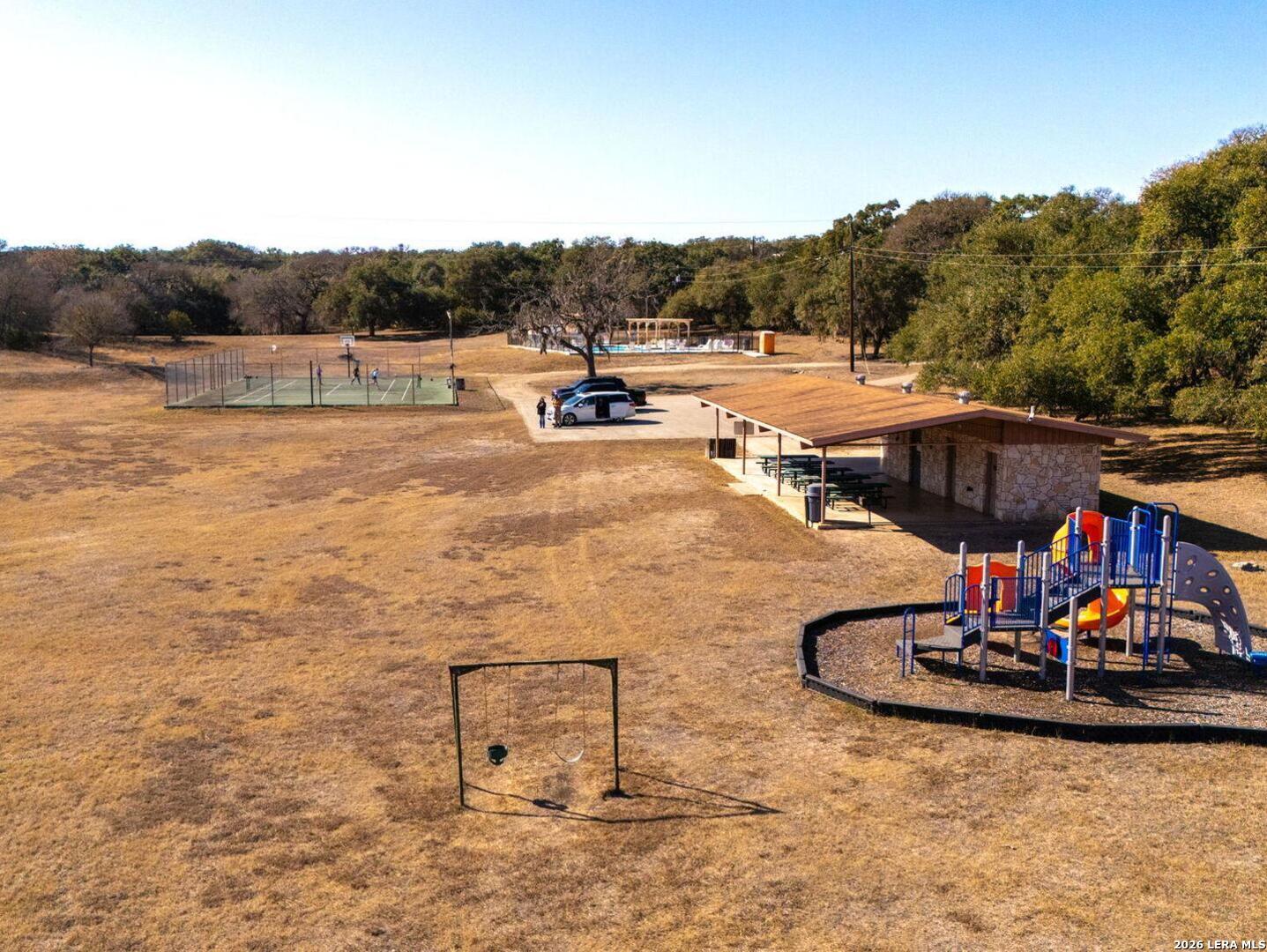 1270 Misty Lane Spring Branch, TX 78070 - Photo 42 of 48 a view of a swimming pool with a patio