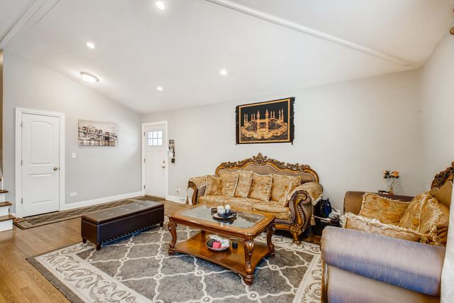 a bedroom with furniture and a couch