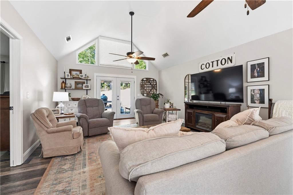 2777 Chickadee Drive Monroe, GA 30655 - Photo 10 of 36 a living room with furniture and a flat screen tv