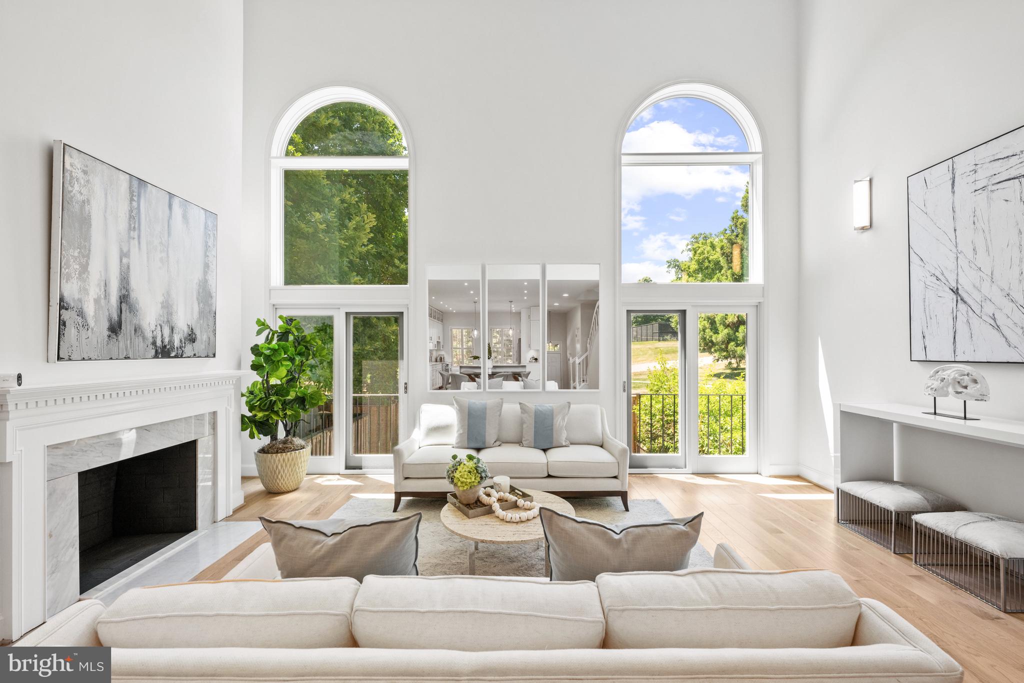 3604 Winfield Lane Northwest Washington, DC 20007 - Photo 4 of 35 a living room with furniture and a fireplace