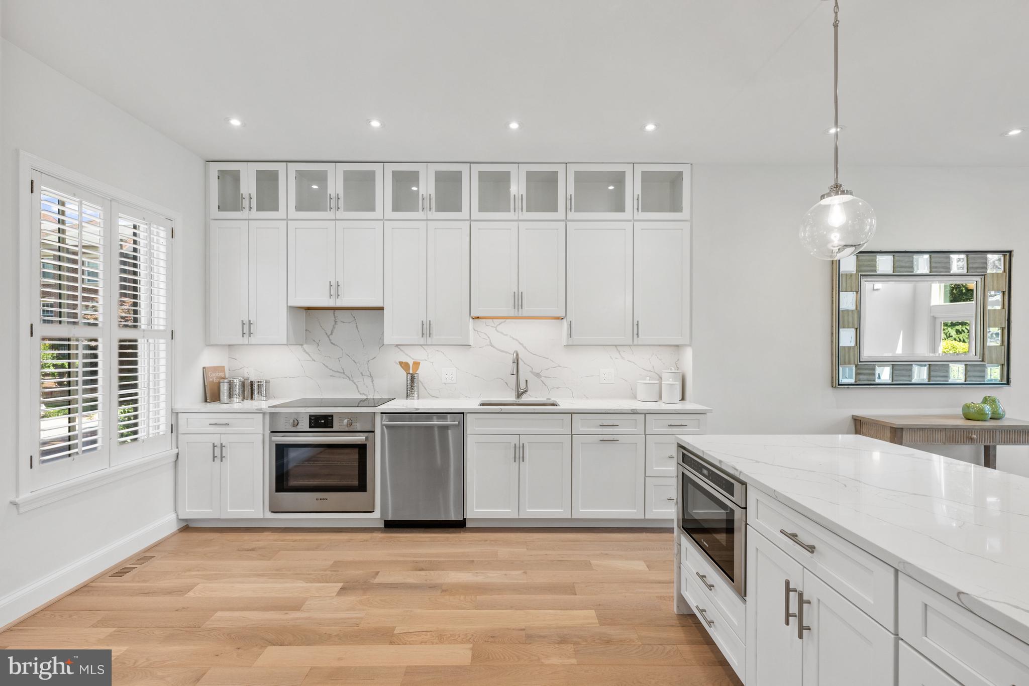 3604 Winfield Lane Northwest Washington, DC 20007 - Photo 9 of 35 a large kitchen with a stove top oven