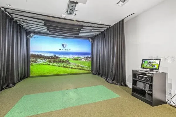 a view of a room with a flat screen tv