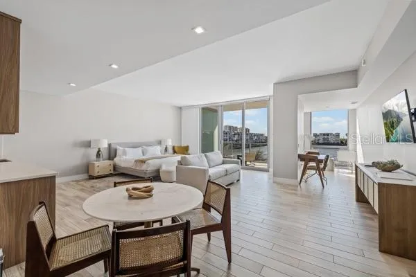a living room with furniture and a table