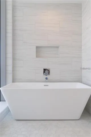 a bathroom with a bathtub