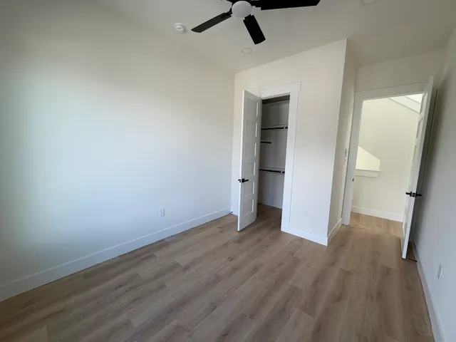 a bathroom with a bathtub and a toilet