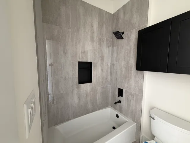 a view of balcony with furniture