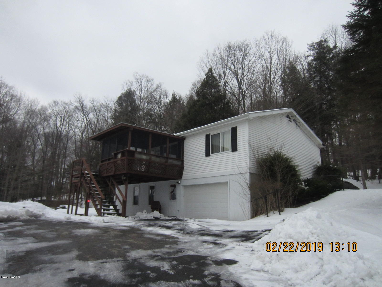 36 East Beach Road Richmond, MA 01201 - Photo 1 of 15 a front view of a house with a yard