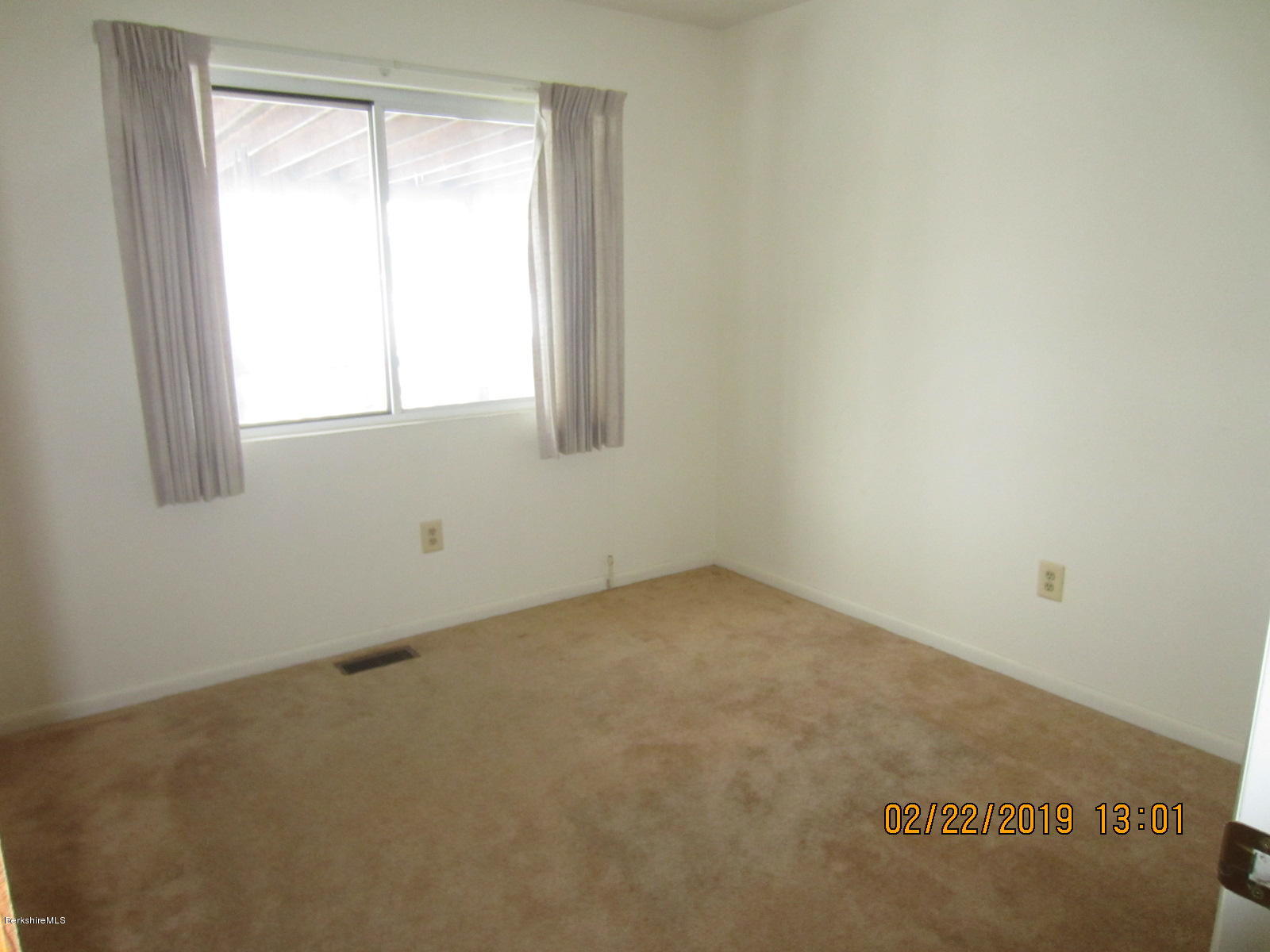 36 East Beach Road Richmond, MA 01201 - Photo 6 of 15 an empty room with a window