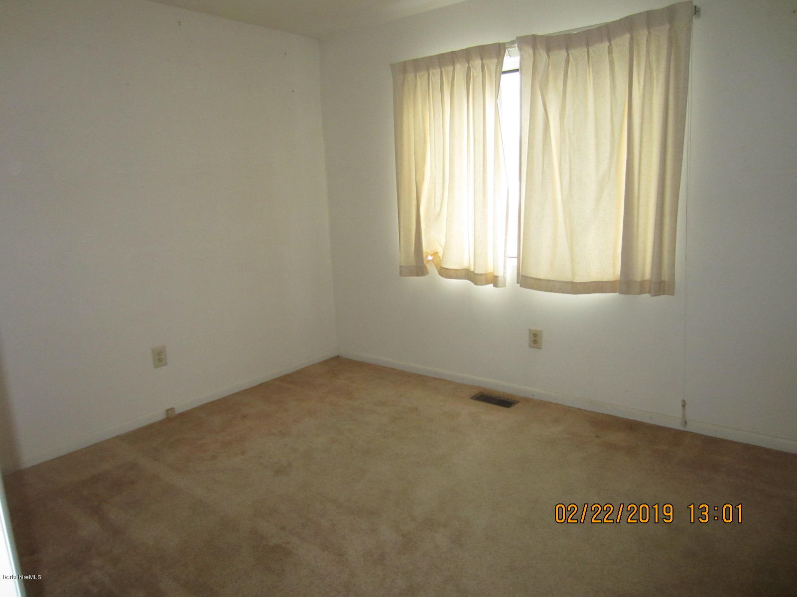 36 East Beach Road Richmond, MA 01201 - Photo 7 of 15 an empty room with a window