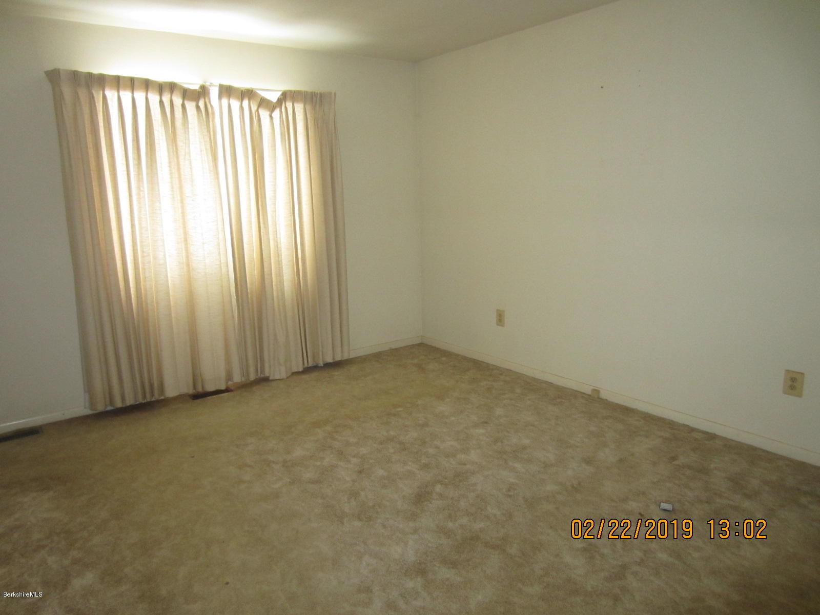 36 East Beach Road Richmond, MA 01201 - Photo 8 of 15 an empty room with windows
