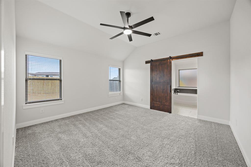 104 Maverick Trail Valley View, TX 76272 - Photo 16 of 30 a view of an empty room with a window
