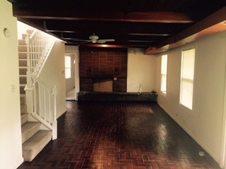 3911 Merioneth Drive Crete, IL 60417 - Photo 7 of 19 a view of an empty room with wooden floor and a window