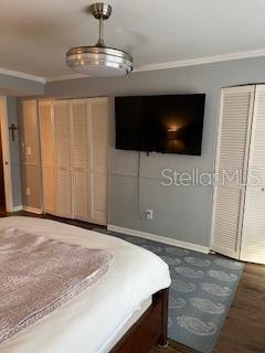 9951 Southwest 88th Court Road, Unit G Ocala, FL 34481 - Photo 17 of 38 a view of a livingroom with a flat screen tv