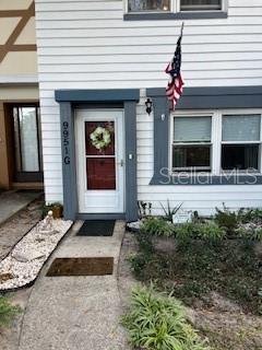 9951 Southwest 88th Court Road, Unit G Ocala, FL 34481 - Photo 2 of 38 a front view of house