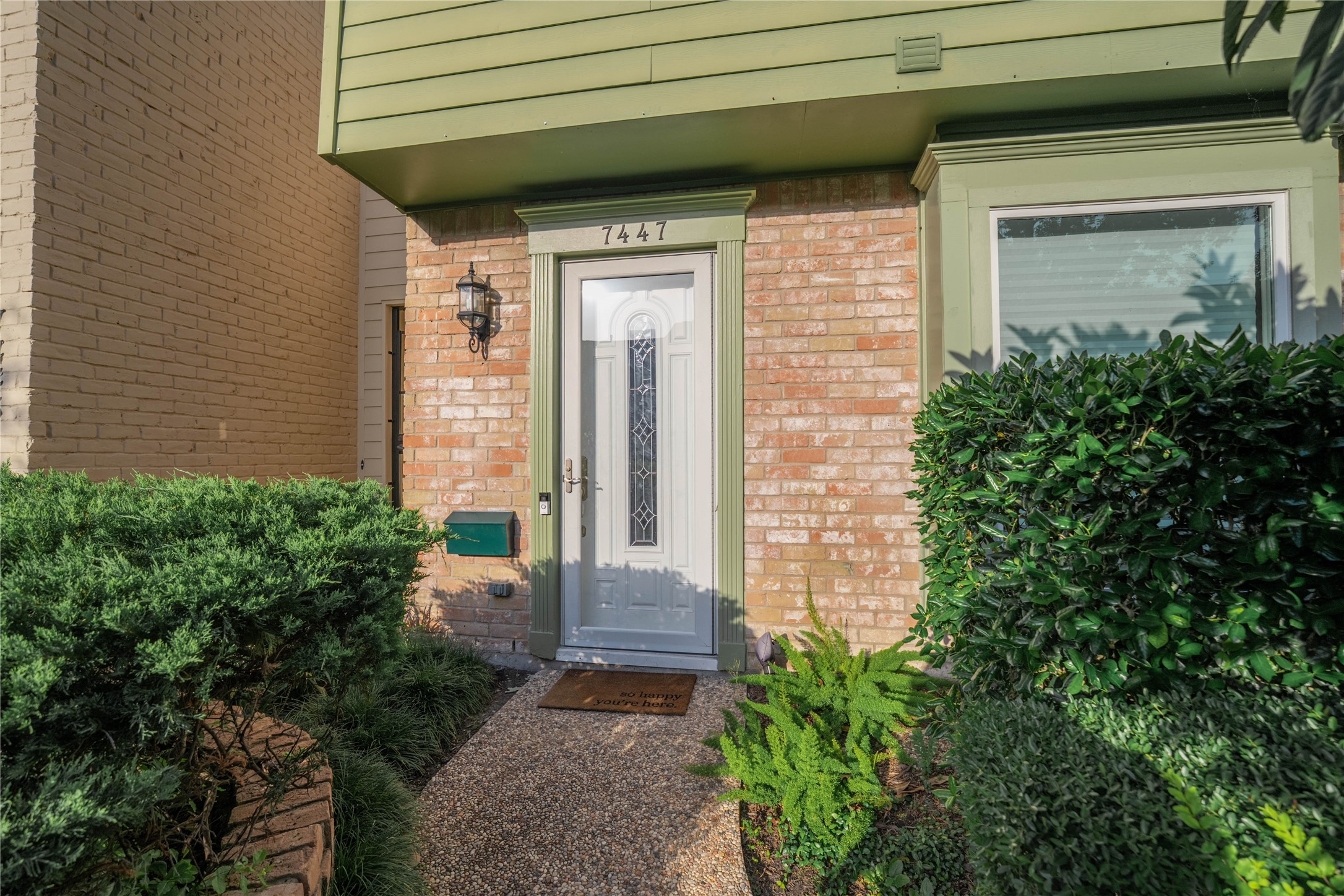 7447 Brompton Street, Unit 7447 Houston, TX 77025 - Photo 3 of 27 Front door entry for the home.