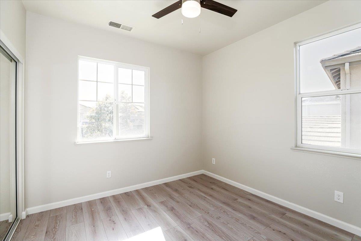 4467 Glenbrook Drive Tracy, CA 95377 - Photo 17 of 26 an empty room with a window