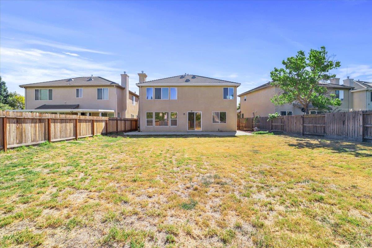 4467 Glenbrook Drive Tracy, CA 95377 - Photo 26 of 26 a front view of a house with a yard