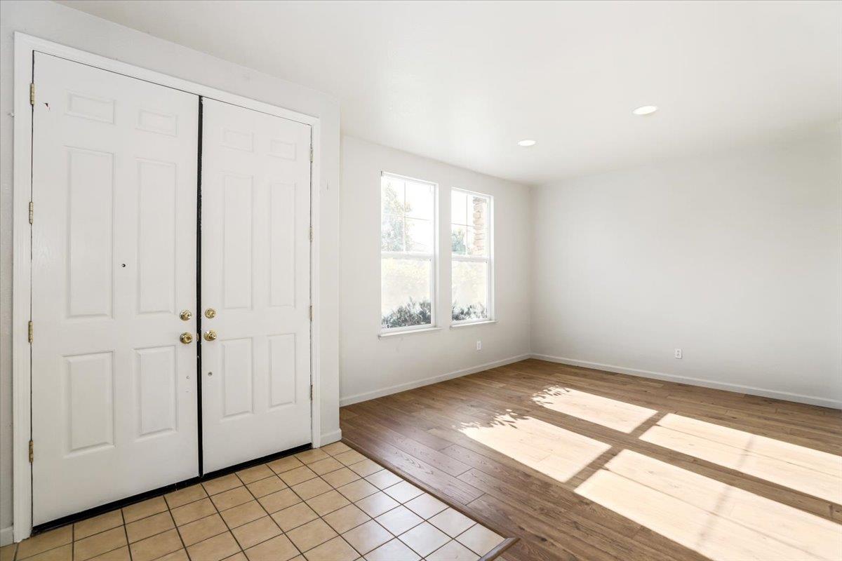 4467 Glenbrook Drive Tracy, CA 95377 - Photo 4 of 26 an empty room with windows
