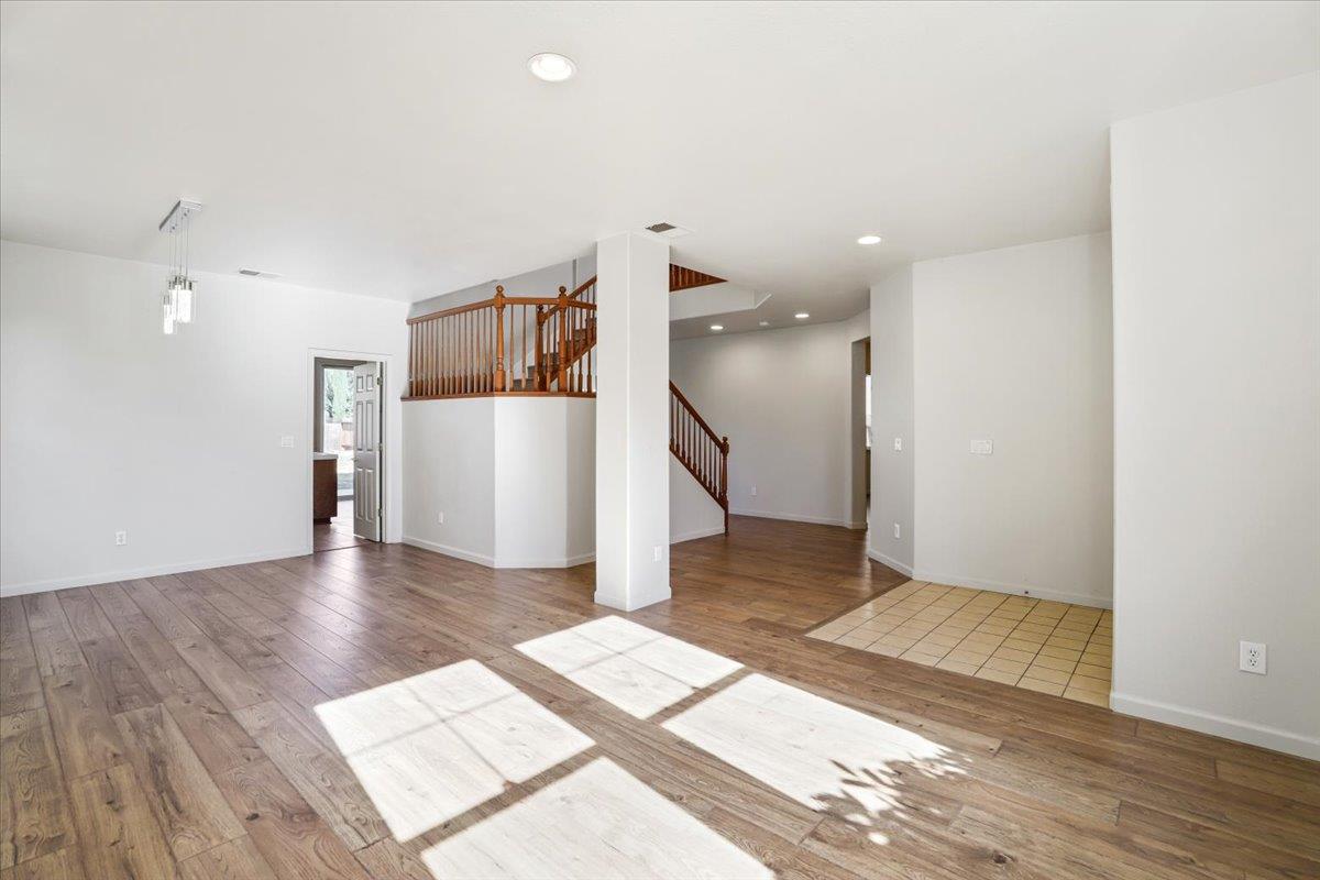 4467 Glenbrook Drive Tracy, CA 95377 - Photo 5 of 26 a view of a kitchen with a refrigerator and a sink